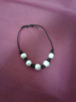 /album/fotogaleria-pulsera-hecha-con-codon-blanco-y-perlas-de-rio/a1472856-416852765109839-1173262664-n-jpg/